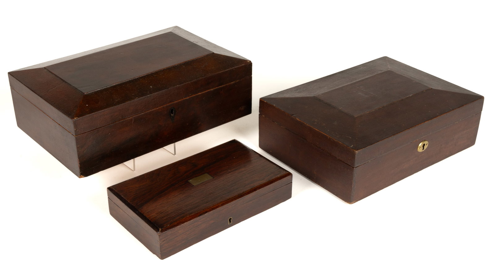 ASSORTED BRITISH WOODEN DOCUMENT / DRESSER / SEWING BOXES, LOT OF THREE: ASSORTED BRITISH WOODEN DOCUMENT / DRESSER / SEWING BOXES, LOT OF THREE, each of rectangular form with a hinged lid, comprising of a diminutive Rosewood example with lid having an unmarked brass 
