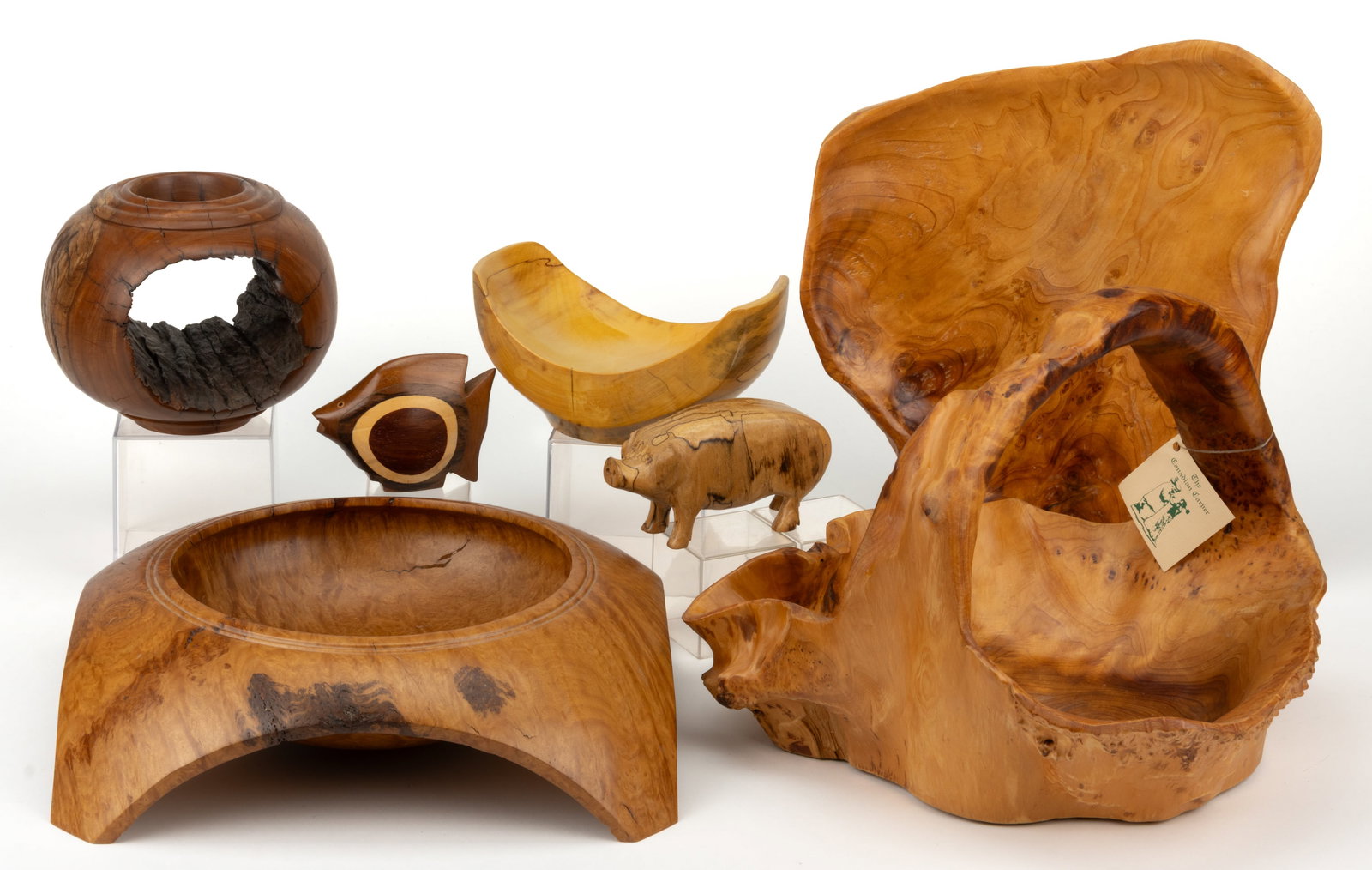 ASSORTED BENCH-MADE AND CARVED / TURNED ARTICLES, LOT OF SEVEN: ASSORTED BENCH-MADE AND CARVED / TURNED ARTICLES, LOT OF SEVEN, including a turned center bowl signed "H Weik"; a turned vase with a natural hole going through the center; a basket-like form
