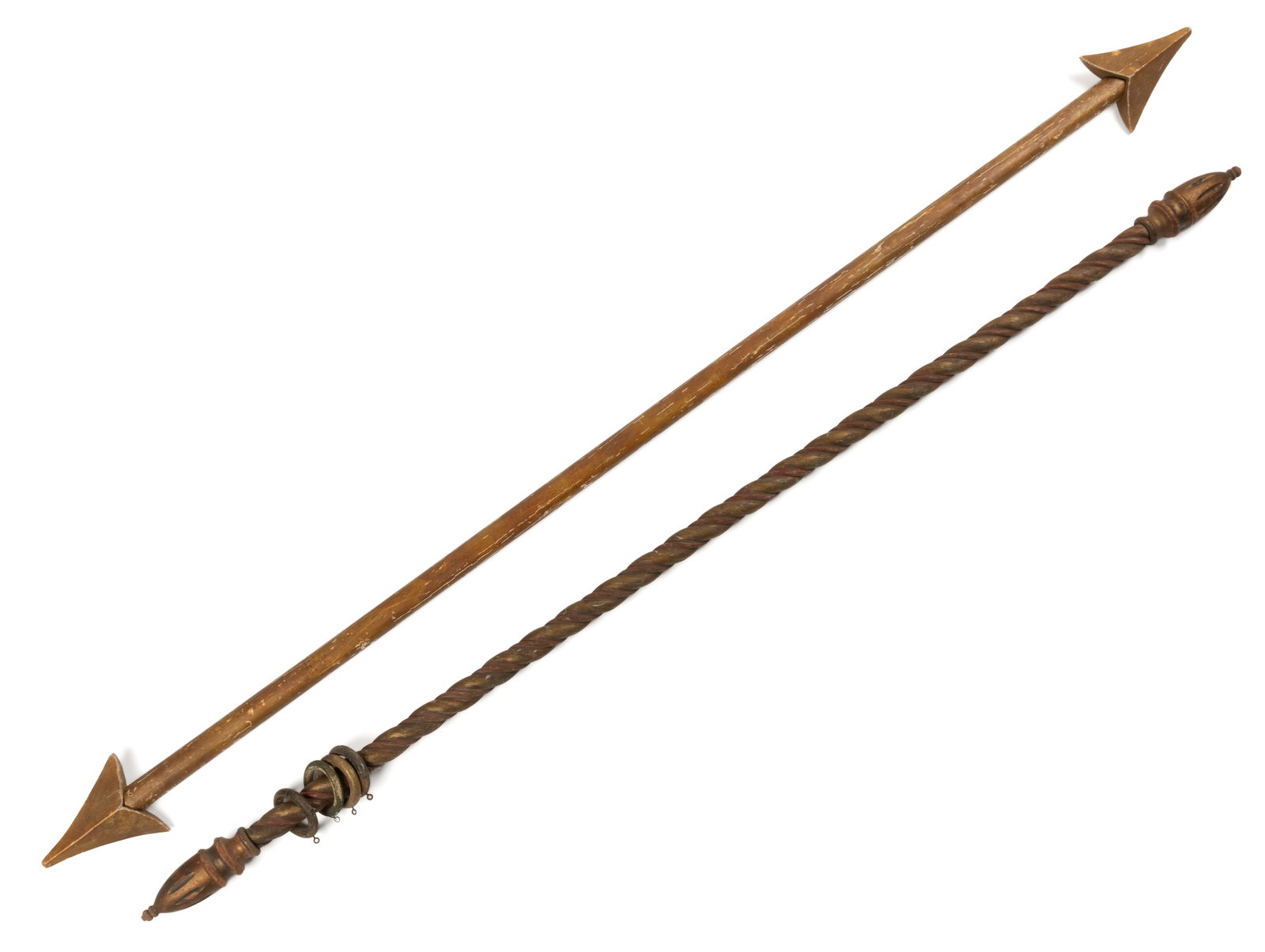 AMERICAN CLASSICAL / VICTORIAN GILTWOOD CURTAIN RODS, LOT OF TWO: AMERICAN CLASSICAL / VICTORIAN GILTWOOD CURTAIN RODS, LOT OF TWO, each of softwood, comprising an example with a plain shaft and arrow-like ends, and an example with a twisted shaft and turned/carved 