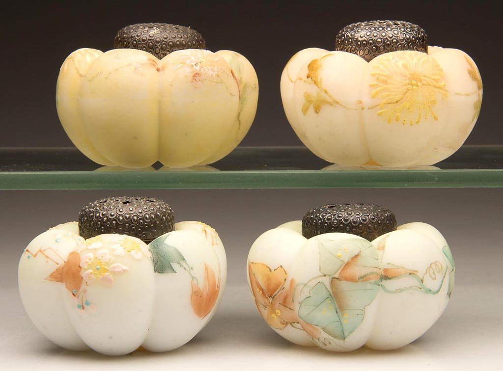 MT. WASHINGTON TOMATO SALT SHAKERS, LOT OF FOUR: MT. WASHINGTON TOMATO SALT SHAKERS, LOT OF FOUR, opal with various colored light grounds and polychrome floral decoration, including two with spider-mum decoration, each with plush/satin finish and ma