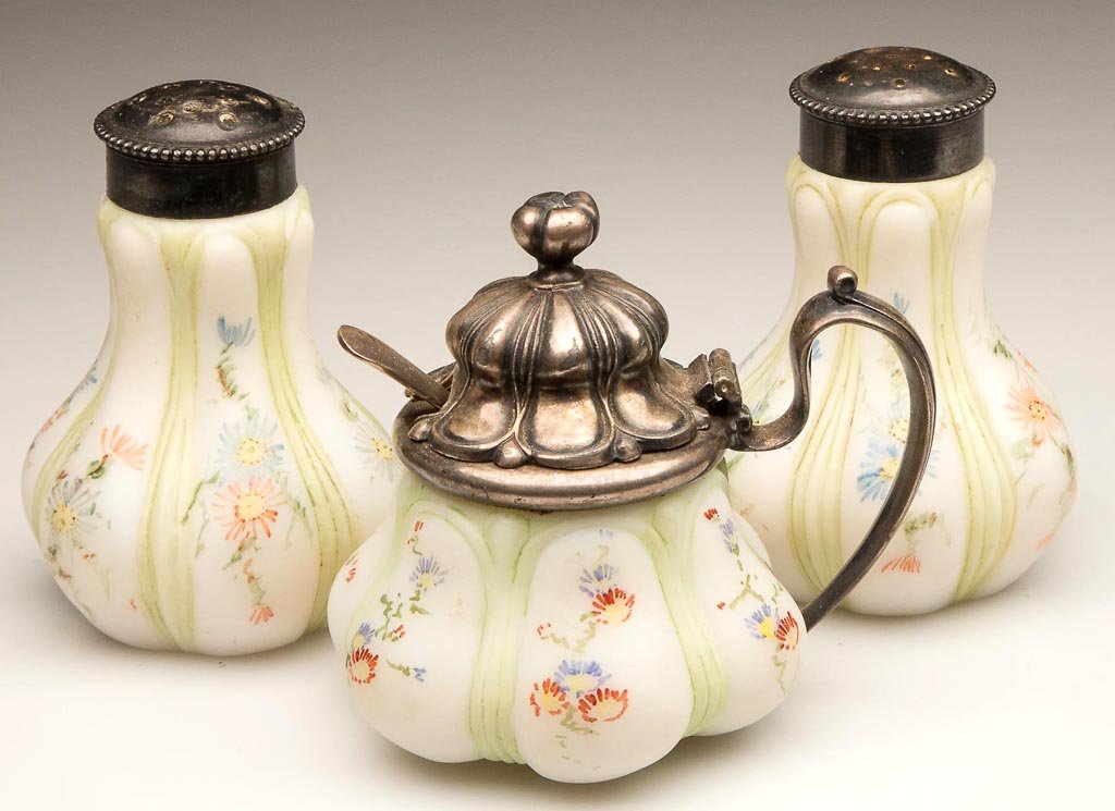 MT. WASHINGTON / PAIRPOINT SIX LOBE CONDIMENTS, LOT OF : MT. WASHINGTON / PAIRPOINT SIX LOBE CONDIMENTS, LOT OF THREE, opal with plush/satin finish and polychrome daisy decorations, comprising a pair of salt and pepper shakers and a mustard pot, matching pe