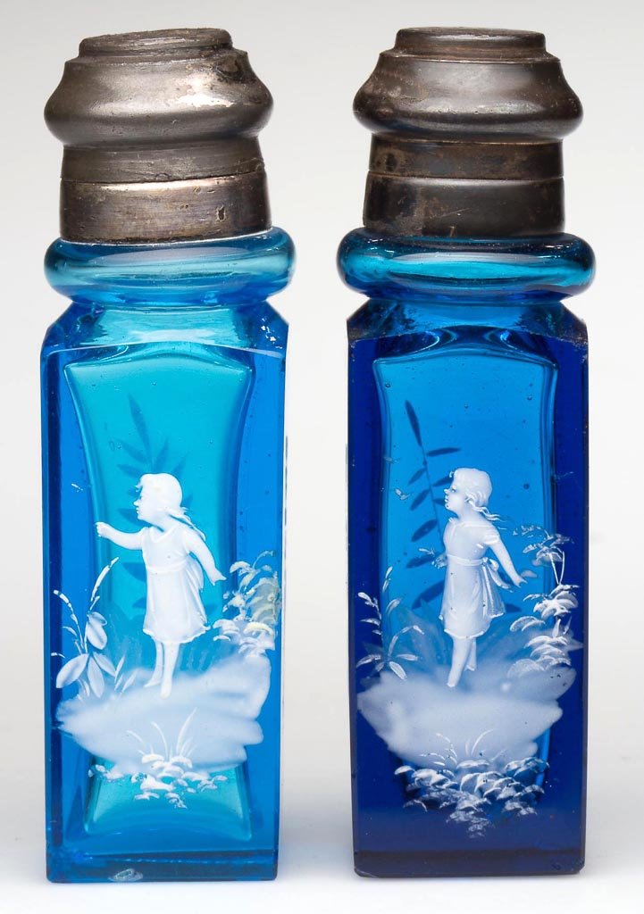 PILLAR - RECTANGULAR SALT AND PEPPER SHAKERS, NEAR PAIR: PILLAR - RECTANGULAR SALT AND PEPPER SHAKERS, NEAR PAIR, slightly differing shades of blue, each with white enamel "Mary Gregory" decoration depicting a girl in a landscape setting with butterflies, a