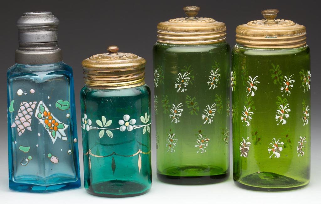 ASSORTED COLORED LARGE SHAKERS, LOT OF FOUR: ASSORTED COLORED LARGE SHAKERS, LOT OF FOUR, blue and shades of green, each with enamel decorations, comprising a Paneled Hexagon, a Rib Optic, and two unpatterned wide pillar, period two-part lids. F
