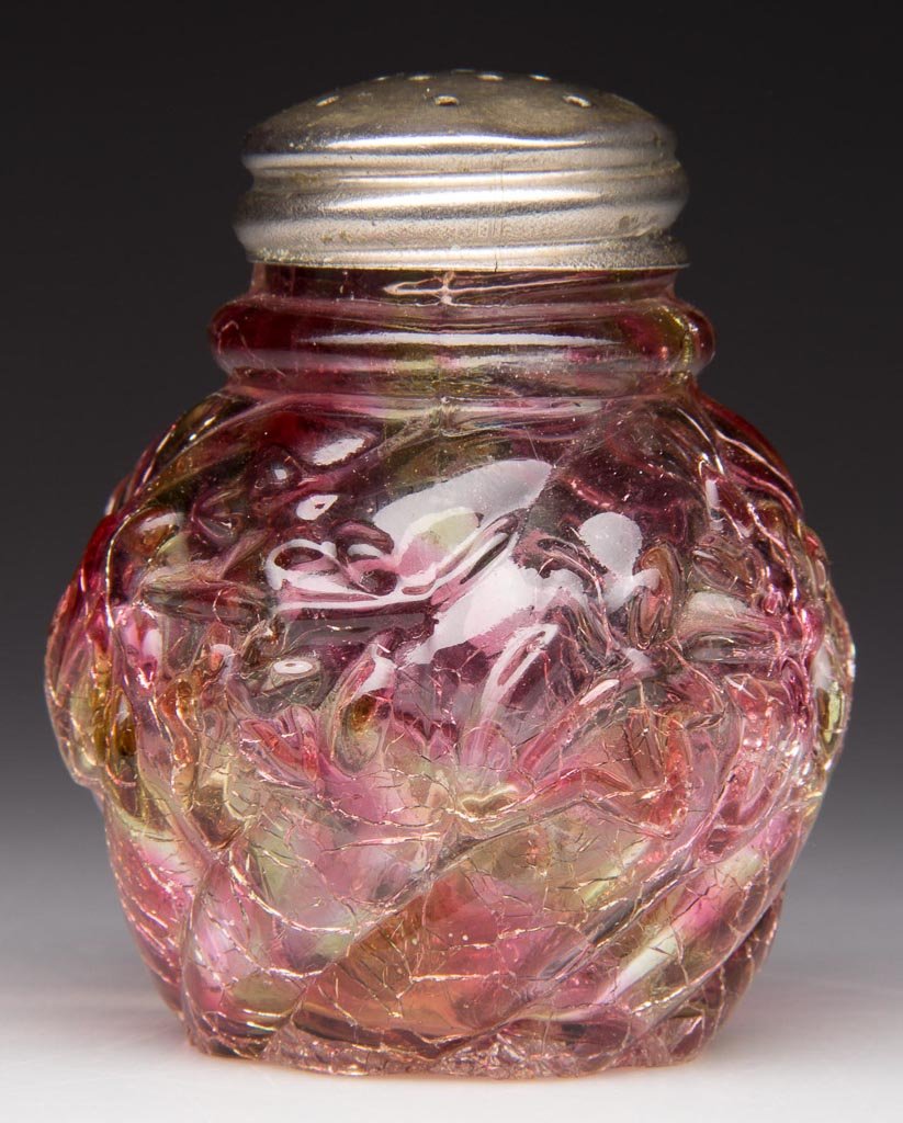 ROYAL IVY SALT SHAKER: ROYAL IVY SALT SHAKER, rainbow spatter craquelle, period lid. Northwood Glass Co. Fourth quarter 19th century. 2 3/4" HOA. Provenance: The collection of the late Richard "Dick" and Mary Ann Krauss of 