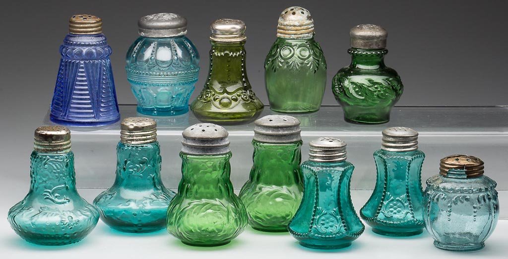 ASSORTED COLORED PATTERN SALT AND PEPPER SHAKERS, LOT O: ASSORTED COLORED PATTERN SALT AND PEPPER SHAKERS, LOT OF 12, various shades of blue and green, pairs and singles, including Flower Mold, Beaded Bottom, and Beaded Loop, most with period lids. Fourth q
