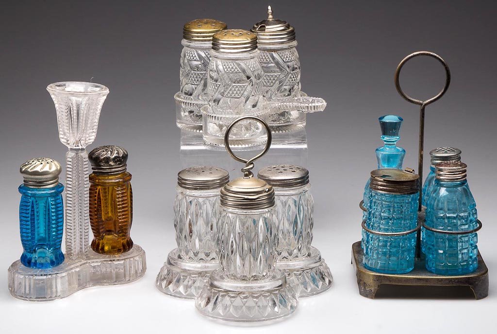 ASSORTED PATTERN CONDIMENT SETS, LOT OF FOUR: ASSORTED PATTERN CONDIMENT SETS, LOT OF FOUR, three all-glass examples comprising a Ladder - Little with blue and amber shakers, Diamond Surface three-bottle set, and Zigzag three-bottle set, each wit