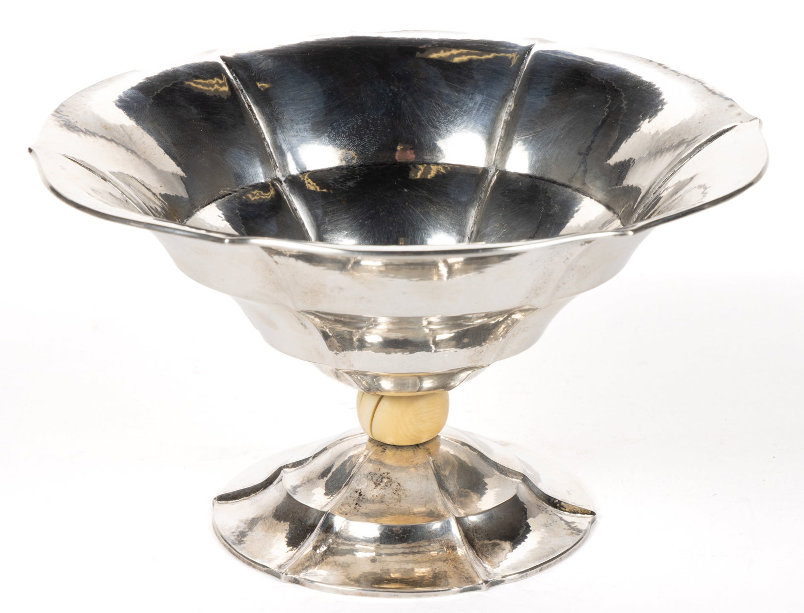 KOCH & BERGFELD, GERMAN ARTS AND CRAFTS 0.800 SILVER FOOTED BOWL: KOCH & BERGFELD, GERMAN ARTS AND CRAFTS 0.800 SILVER FOOTED BOWL, having all-over hammered texture, conical bowl with six petaled rim and ridged design, raised on round foot with similar design an