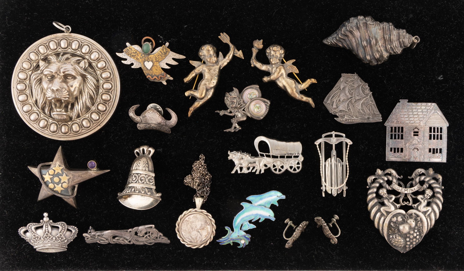 VINTAGE / CONTEMPORARY FIGURAL STERLING SILVER JEWELRY WITH CHRISTMAS ORNAMENT, LOT OF 20 PIECES: VINTAGE / CONTEMPORARY FIGURAL STERLING SILVER JEWELRY WITH CHRISTMAS ORNAMENT, LOT OF 20 PIECES, comprising 13 brooches / pins including an enameled example with two dolphins, a star, a bell, and a U