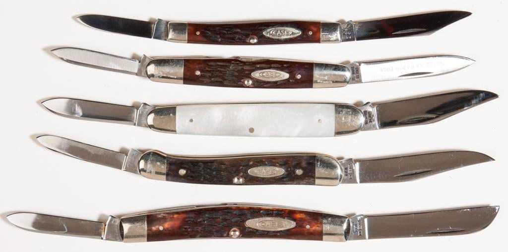 CASE XX VARIOUS HANDLE POCKET KNIVES, LOT OF FIVE: CASE XX VARIOUS HANDLE POCKET KNIVES, LOT OF FIVE, comprising four jigged bone handle examples, including a No. 6233 Senator lacking dating mark, a No. 06263 Eisenhower dated for 1973, a No. 62052 Con