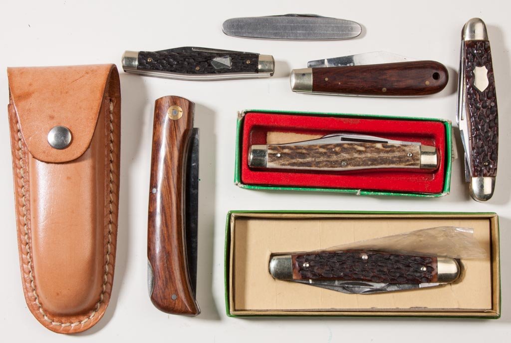 VARIOUS GERMAN POCKET KNIVES, LOT OF SEVEN: VARIOUS GERMAN POCKET KNIVES, LOT OF SEVEN, comprising two J. A. Henckels including a stag handle marked "190" on tang and blade marked "PREMIUM STOCK KNIFE" and a wooden handle; three jigged handle e