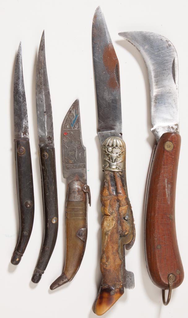 VINTAGE POCKET KNIVES, LOT OF FIVE: VINTAGE POCKET KNIVES, LOT OF FIVE, bone and wood handles, including a figural hoof example with tang marked "Austria", an example with blade embossed "Toledo" and reverse illegible "CORR???", two exa