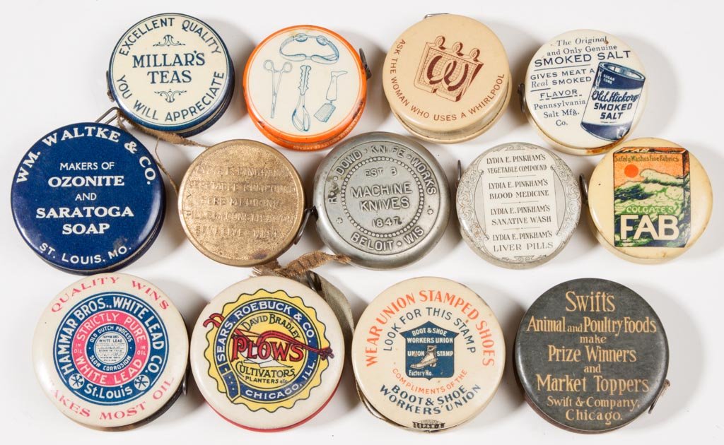 ASSORTED ADVERTISING TAPE MEASURES, LOT OF 13: ASSORTED ADVERTISING TAPE MEASURES, LOT OF 13, celluloid and metal, including David Bradley Plows, R. J. Dowd Knife Works, Lydia E. Pinkham, Lewis Lye, Swifts, etc. Late 19th/mid 20th century. 1 1/2" 