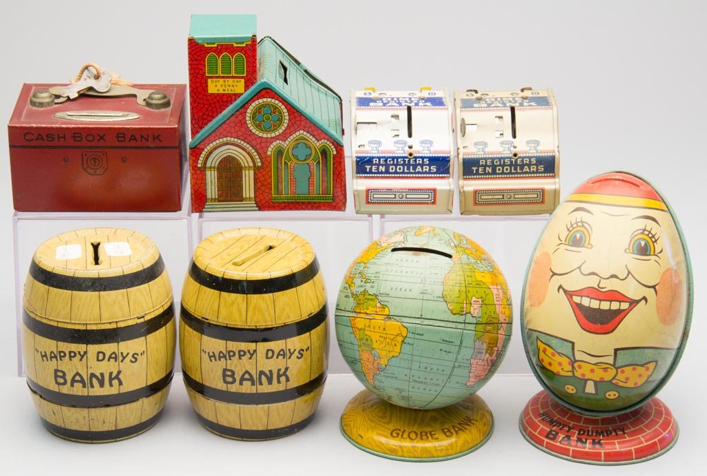 ASSORTED J. CHEIN TIN PENNY BANKS, LOT OF EIGHT: ASSORTED J. CHEIN TIN PENNY BANKS, LOT OF EIGHT, including Humpty Dumpty. First half 20h century. 2" to 5 1/2" H. Provenance: From the collection of the late Betty Jane Renn, Sunbury, PA.