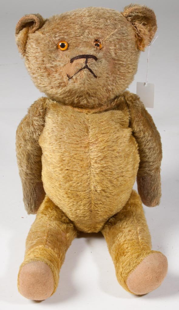 VINTAGE MOHAIR TEDDY BEAR: VINTAGE MOHAIR TEDDY BEAR, fully jointed with a full belly, straw filled, glass eyes. First quarter 20th century. 25" H. Provenance: The estate collection of Richard and Betty Robertson, Waynesboro, V