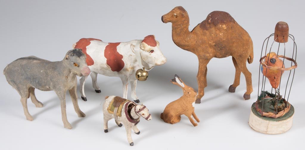 GERMAN PAPIER-MACHE ANIMALS, LOT OF SIX: GERMAN PAPIER-MACHE ANIMALS, LOT OF SIX, including a parrot in cage squeaker and a nodding-head horse. First quarter 20th century. 2 1/2" to 5 1/4" H. Provenance: The estate collection of Richard and 