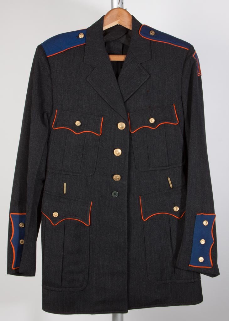 1939 NEW YORK WORLD'S FAIR UNIFORM JACKET: 1939 NEW YORK WORLD'S FAIR UNIFORM JACKET, possibly a Policeman's jacket, with appropriate brass buttons and arm patch, Smith-Gray, New York maker's label, made for Oliver Albert Austin, 3/21/39. 36"