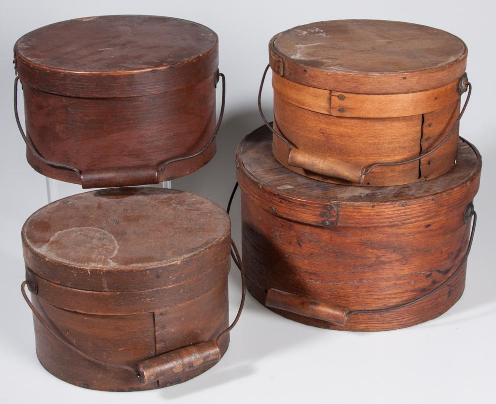 COUNTRY BENTWOOD BOXES, LOT OF FOUR: COUNTRY BENTWOOD BOXES, LOT OF FOUR, each with original cover and bail handle. Late 19th/early 20th century. 8 3/4" to 11 1/2" D. Provenance: The estate collection of Richard and Betty Robertson, Wayn