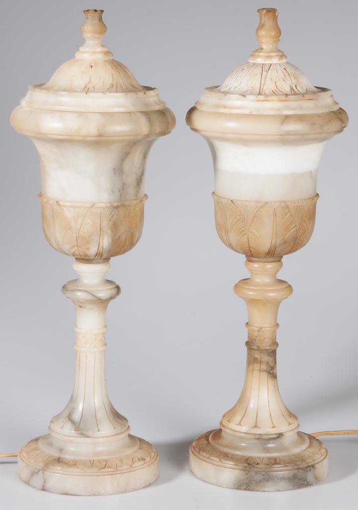 ITALIAN NEOCLASSICAL ALABASTER PAIR OF MANTEL TORCHERE: ITALIAN NEOCLASSICAL ALABASTER PAIR OF MANTEL TORCHERE, each with removable cover and single interior socket. First half 20th century. 19 1/2" HOA. Provenance: From an Illinois private collection.