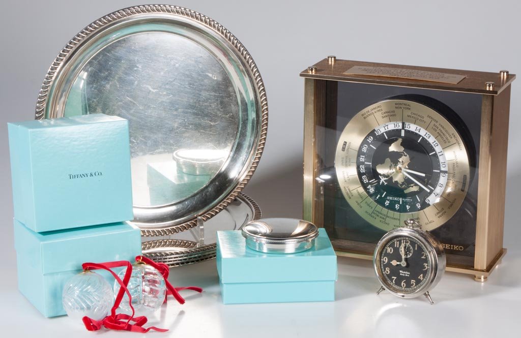 ASSORTED CLOCKS AND OTHER ARTICLES, LOT OF NINE: ASSORTED CLOCKS AND OTHER ARTICLES, LOT OF NINE, including a Seiko quartz World clock and various Tiffany & Co. retailed items. 20th century. Clock 8 1/4" H. Provenance: From a Connecticut private col