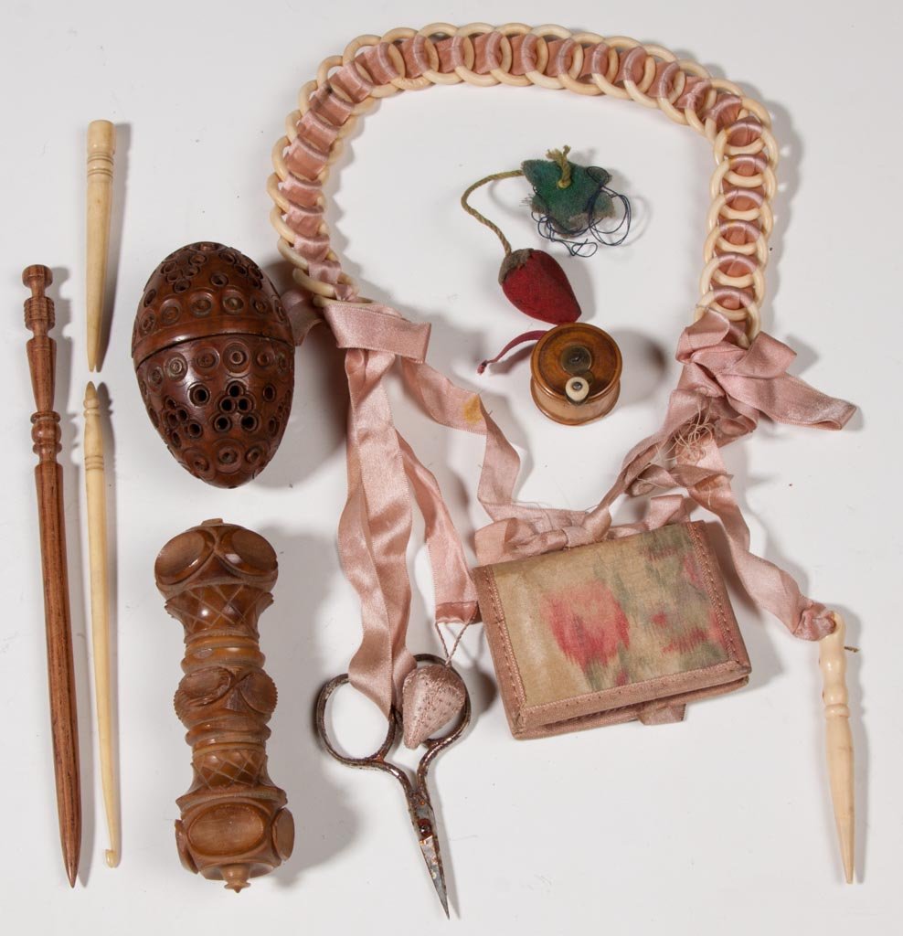 ASSORTED VINTAGE SEWING ACCOUTREMENTS, LOT OF EIGHT: ASSORTED VINTAGE SEWING ACCOUTREMENTS, LOT OF EIGHT, including a chatelaine, a vegetable ivory/nut needle case and egg, etc. Fourth quarter 19th/first quarter 20th century. Needle case 3 3/4" L. Prove