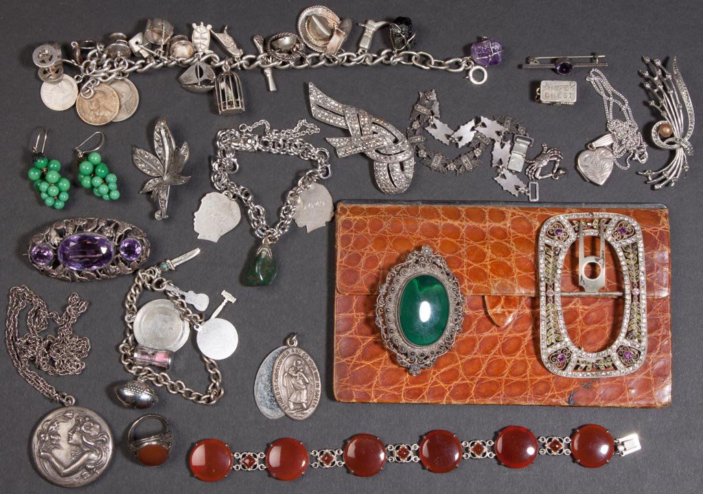 VINTAGE STERLING SILVER JEWELRY, LOT OF 21 PIECES: VINTAGE STERLING SILVER JEWELRY, LOT OF 21 PIECES, including three charm bracelets, an Art Nouveau locket marked "S M & S", examples set with marcasite and stones, leather wallet with silver edge, etc