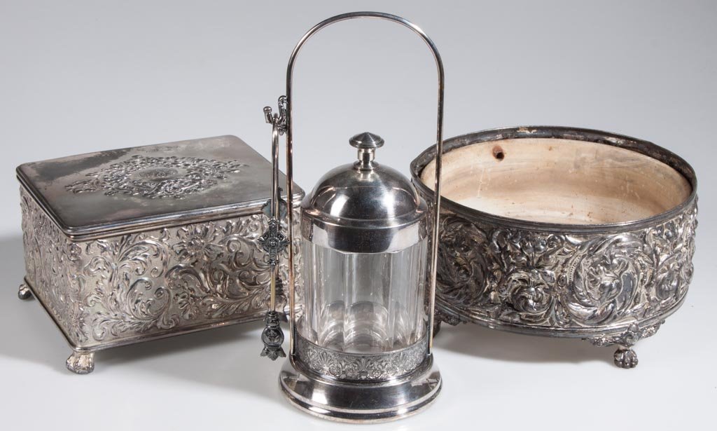 AMERICAN VICTORIAN QUADRUPLE PLATE ARTICLES, LOT OF THR: AMERICAN VICTORIAN QUADRUPLE PLATE ARTICLES, LOT OF THREE, including a Pairpoint hinged-lid box and a Hartford fernery with original ceramic liner. Fourth quarter 19th/early century. Box 6 1/2" x 5 1/