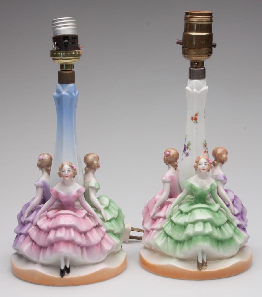 BAVARIAN CHINA FIGURAL BEDROOM LAMPS, LOT OF TWO: BAVARIAN CHINA FIGURAL BEDROOM LAMPS, LOT OF TWO, each featuring three seated ladies, marked "Bavaria" only. First half 20th century. 11 1/2" H. Provenance: The collection of the late Richard "Dick" a