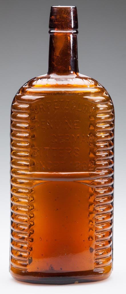 DR. PETZOLD'S GERMAN BITTERS FIGURAL BOTTLE: DR. PETZOLD'S GERMAN BITTERS FIGURAL BOTTLE, golden amber, 21 horizontal ribs, embossed "PATENTED 1874" below neck and "DR. PETZOLD'S / GENUINE / GERMAN / BITTERS / INCPT. 1862", applied sloping mouth