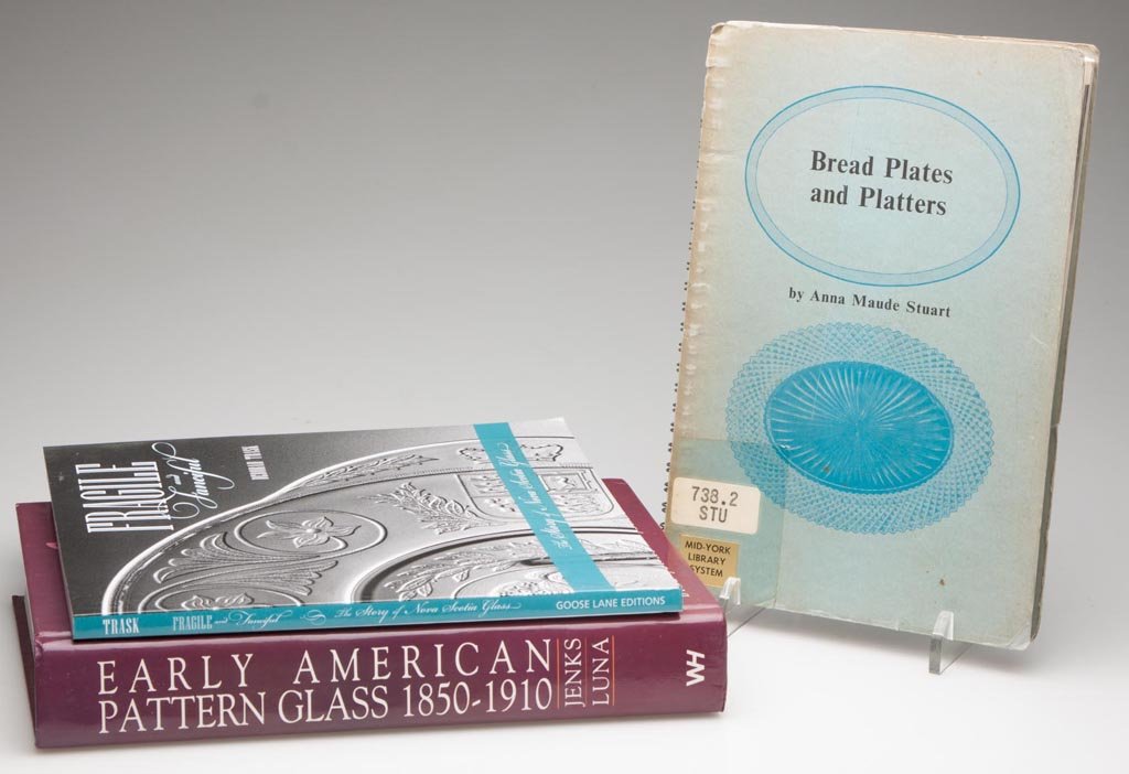 VARIOUS AMERICAN PRESSED GLASS REFERENCE VOLUMES, LOT: VARIOUS AMERICAN PRESSED GLASS REFERENCE VOLUMES, LOT OF THREE, including Stuart, "Bread Plates and Platters" and Trask, "Fragile and Fanciful". Hard and soft covers. Provenance: From a Pennsylvania p