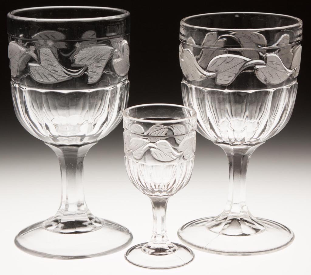 FROSTED LEAF STEMS, LOT OF THREE: FROSTED LEAF STEMS, LOT OF THREE, colorless lead glass, comprising a large goblet, small goblet and wine glass. Third quarter 19th century. 6 1/8", 5 7/8" and 4 7/8" H. Provenance: From a Vermont priv