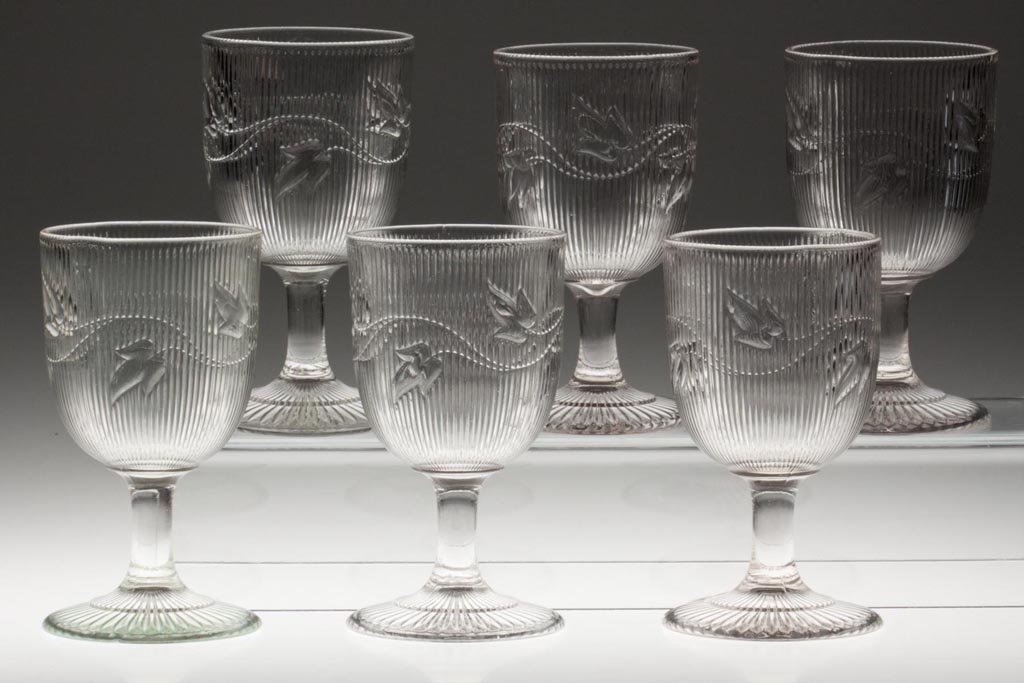 RIBBED IVY GOBLETS, LOT OF SIX: RIBBED IVY GOBLETS, LOT OF SIX, colorless lead glass. Third quarter 19th century. 5 7/8" H. Provenance: Lillian "Lil" and Walter "Bud" Marchant Collection/Lil-Bud Antiques.