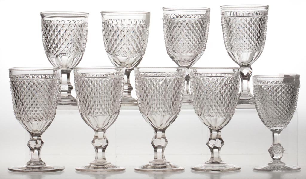 ASSORTED DIAMOND POINT GOBLETS, LOT OF NINE: ASSORTED DIAMOND POINT GOBLETS, LOT OF NINE, colorless lead glass, including two Umbilicated examples and a Fancy Knob-stem example. Four with polished pontil marks, one with rough pontil mark. Third 