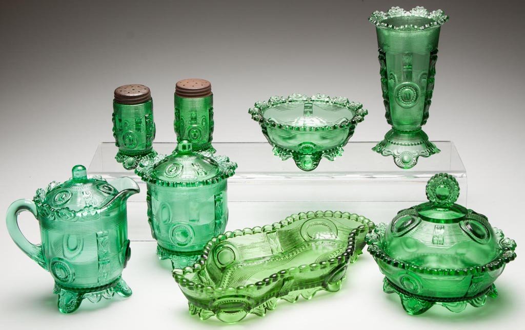 GREENTOWN DEWEY TABLE ARTICLES, LOT OF EIGHT: GREENTOWN DEWEY TABLE ARTICLES, LOT OF EIGHT, green, including a small creamer and a pair of salt and pepper shakers. Indiana Tumbler & Goblet Co. Pattern introduced 1898. 1 7/8" to 5 5/8" HOA. Proven