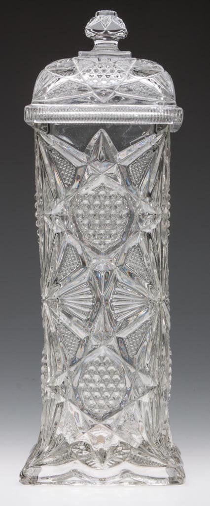 ILLINOIS STRAW JAR: ILLINOIS STRAW JAR, colorless, with lid. U.S. Glass Co. Late 19th/early 20th century. 12 5/8" HOA. Provenance: From the collection of the late Betty Jane Renn, Sunbury, PA.