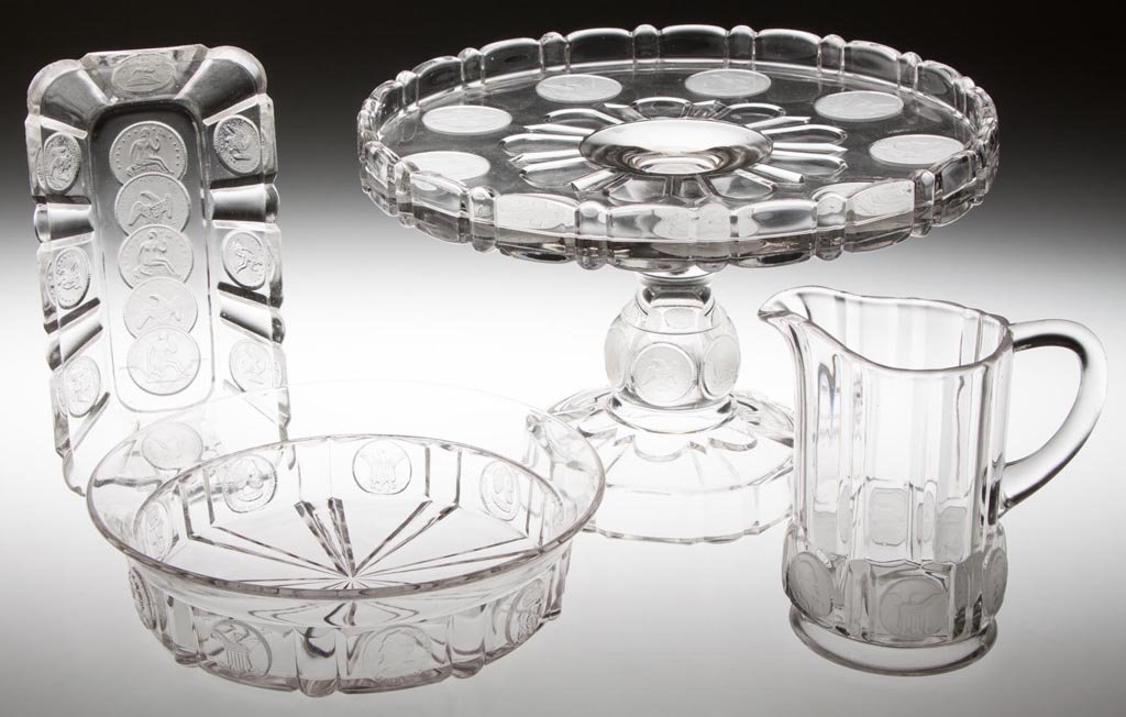 U.S. AND COLUMBIAN COIN TABLE ARTICLES, LOT OF FOUR: U.S. AND COLUMBIAN COIN TABLE ARTICLES, LOT OF FOUR, colorless, three with frosted coins, comprising a U. S. Coin salver/cake stand and pickle dish, and a Columbian Coin berry bowl with a flared top a