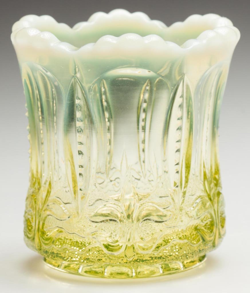 IRIS WITH MEANDER TOOTHPICK HOLDER: IRIS WITH MEANDER TOOTHPICK HOLDER, canary opalescent. Jefferson Glass Co. Pattern introduced 1904. 2 1/2" HOA. Provenance: From a Washington state private collection. Acquired from Steve Sandeman.