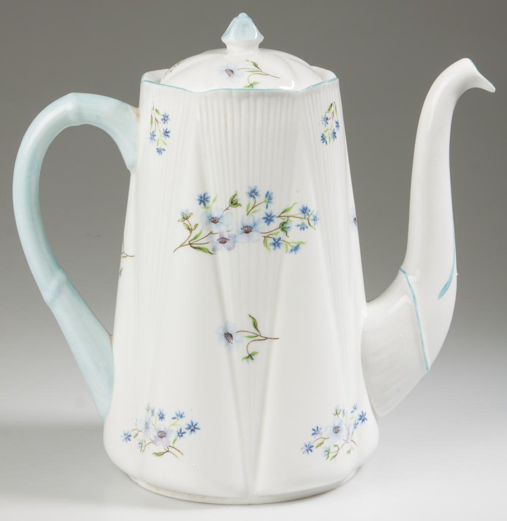 ENGLISH PORCELAIN SHELLEY CHINA LTD. ARTICLES, LOT OF T: ENGLISH PORCELAIN SHELLEY CHINA LTD. ARTICLES, LOT OF TWO A "BLUE ROCK" PATTERN, "DAINTY" SHAPE TEAPOT AND COVER, of flaring cylindrical form, with molded tubular handle painted in pale-blue, the spou
