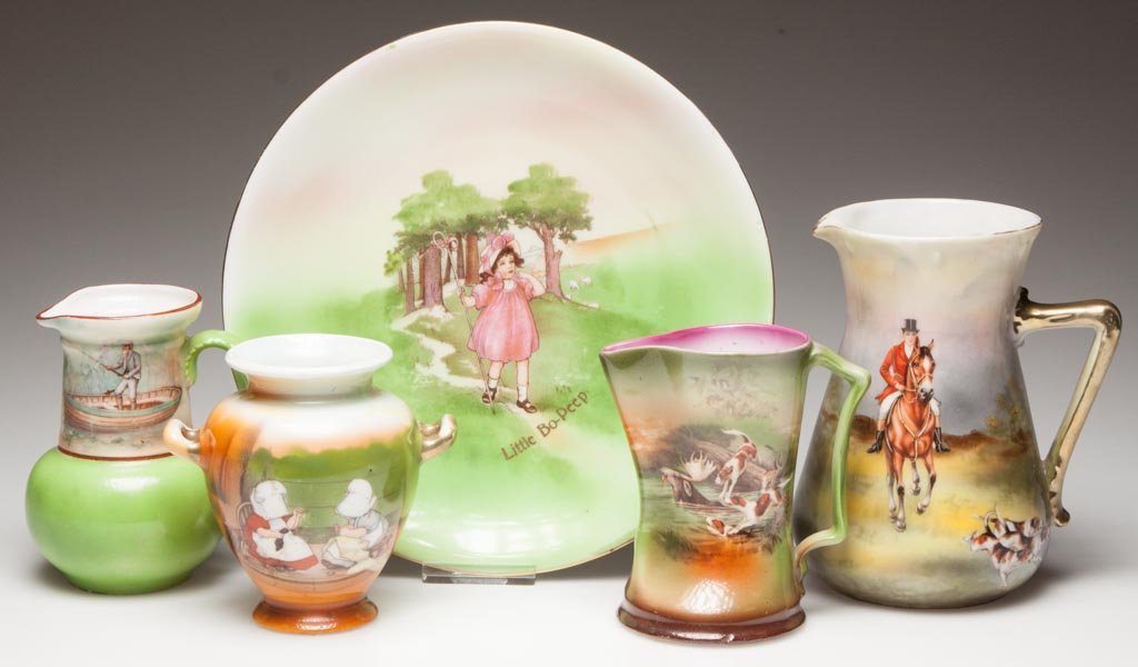 GERMAN PORCELAIN, ROYAL BAYREUTH PORCELAIN ARTICLES, LO: GERMAN PORCELAIN, ROYAL BAYREUTH PORCELAIN ARTICLES, LOT OF FIVE, including three pitchers featuring "Moose Trapping," a mounted equestrian with hounds, "Fox Hunting," and an older man in a canoe fish