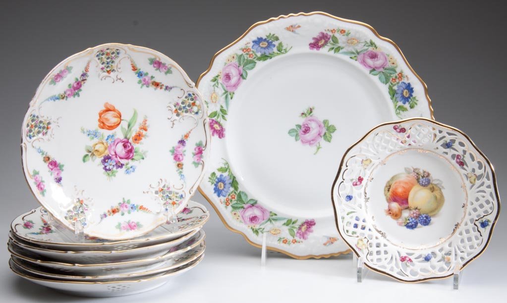 GERMAN & CZECH PORCELAIN TABLE ARTICLES, LOT OF EIGHT I: GERMAN & CZECH PORCELAIN TABLE ARTICLES, LOT OF EIGHT INCLUDING SIX SCHUMANN DRESDEN "BAVARIAN" PATTERN BASKET-MOLDED DISHES, painted with flowers within gilt rims; another pierced, reticulated basket