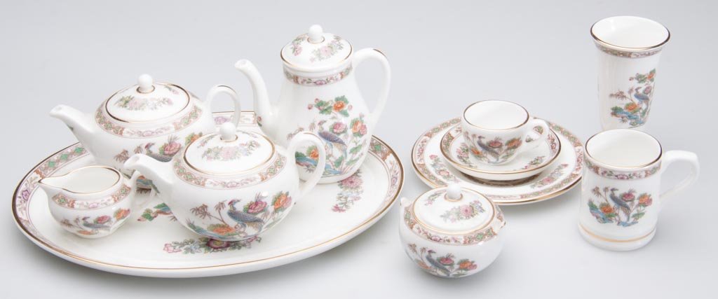 BRITISH PORCELAIN WEDGWOOD BONE CHINA MINIATURE TABLE A: BRITISH PORCELAIN WEDGWOOD BONE CHINA MINIATURE TABLE ARTICLES, LOT OF 11, including a serving tray, two teapots and covers; a coffee pot and cover, a creamer and sugar, a trio of cup, saucer and plat