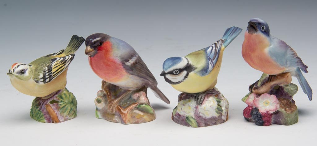ENGLISH PORCELAIN ROYAL WORCESTER BIRD FIGURAL GROUPS, : ENGLISH PORCELAIN ROYAL WORCESTER BIRD FIGURAL GROUPS, LOT OF FOUR, including unglazed specimens of "Blue Bird," #3649; "Blue Tit," #3199; "Gold Crest," #3338; and a glazed "Bull Finch," #3238, all wi
