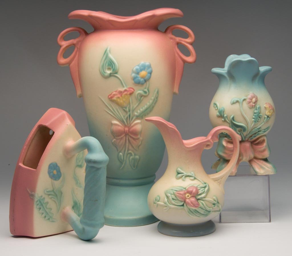 AMERICAN ARTS & CRAFTS HULL POTTERY ARTICLES, LOT OF FO: AMERICAN ARTS & CRAFTS HULL POTTERY ARTICLES, LOT OF FOUR, including two vases; a pitcher and an unmarked wall pocket modeled as an iron, all with typical pink and blue on cream-ground colors, incorpo