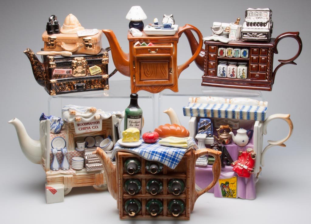 ENGLISH STAFFORDSHIRE NOVELTY TEAPOTS, LOT OF SIX INCLU: ENGLISH STAFFORDSHIRE NOVELTY TEAPOTS, LOT OF SIX INCLUDING LARGE LIMITED EDITIONS BY PAUL CARDEW AND SWINESIDE POTTERIES, models include "Cardew's Antiques" "Tea Shop", "Woodmanton China Shop," "Wine