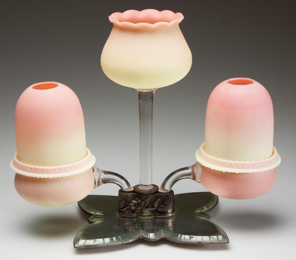 WEBB BURMESE PLATEAU EPERGNE FAIRY LAMP: WEBB BURMESE PLATEAU EPERGNE FAIRY LAMP, plush finish, featuring two colorless glass arms, each supporting a plain-rim base fitted with fairy-size dome and a non-period Fenton Burmese lamp cup, center