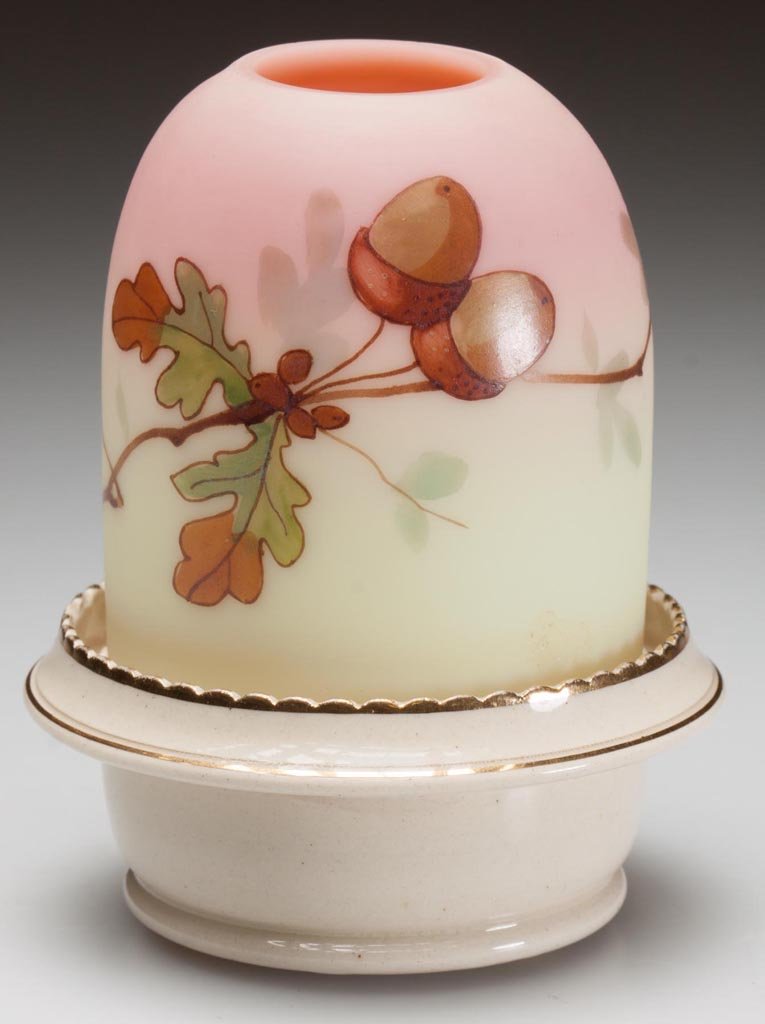 WEBB BURMESE AND CERAMIC FAIRY LAMP: WEBB BURMESE AND CERAMIC FAIRY LAMP, plush finish, pyramid-size dome with polychrome oak leaf and acorn decoration, fitted on a ceramic lamp cup with S. Clarke's patent, bottom is marked for Taylor, T