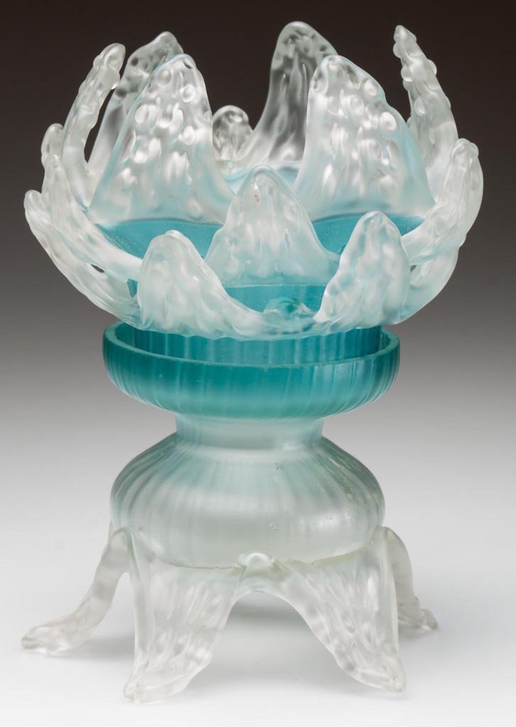 FLORIFORM FAIRY LAMP: FLORIFORM FAIRY LAMP, soft blue and colorless, satin finish, ribbed shade with three rows of applied up-turned flower petals and two air vents at bottom edge, on a matching base raised on five applied