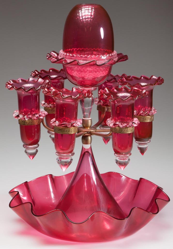 HORNCASTLE STUDIOS EPERGNE FAIRY LAMP: HORNCASTLE STUDIOS EPERGNE FAIRY LAMP, cased cranberry, featuring a central fairy-size dome surrounded by six brass arms supporting flower vases with applied colorless rigaree bands and lower drops, a