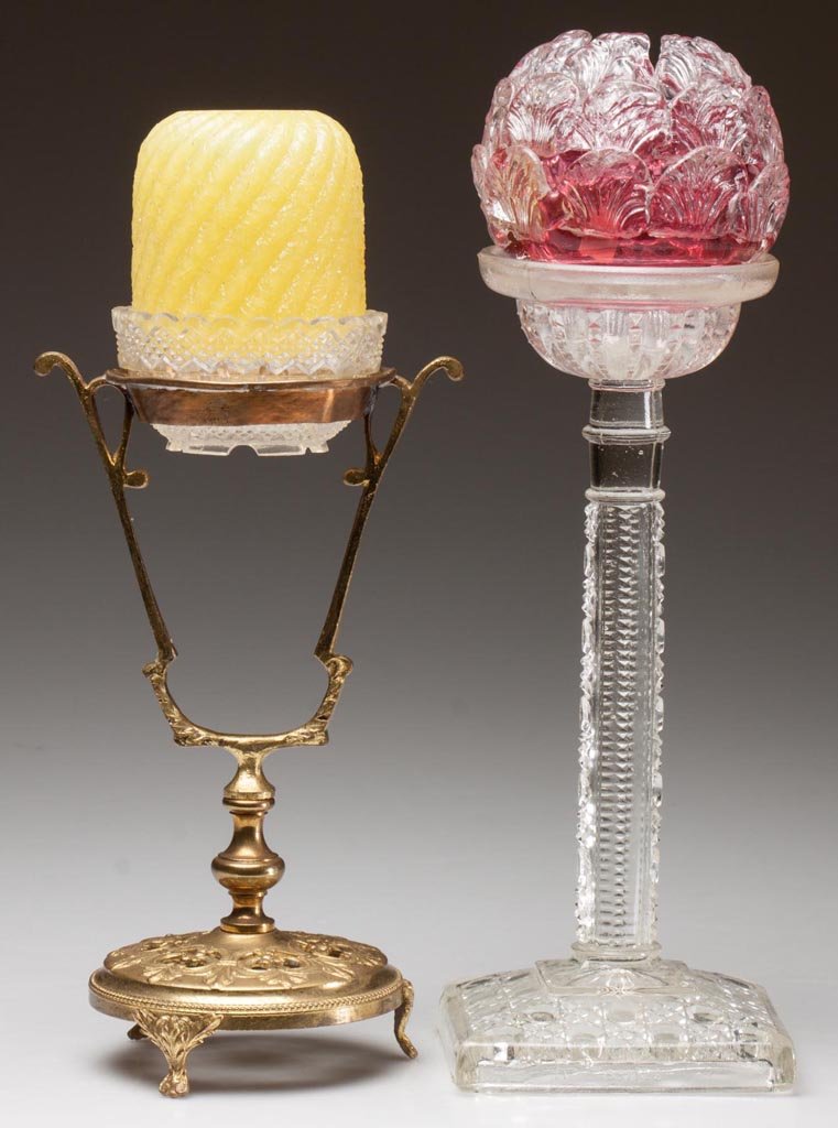 ASSORTED GLASS FAIRY LAMPS ON STANDARDS, LOT OF TWO: ASSORTED GLASS FAIRY LAMPS ON STANDARDS, LOT OF TWO, each pyramid-size dome, comprising a cranberry example with applied colorless leaves raised on a pressed glass standard, and a yellow overshot exam
