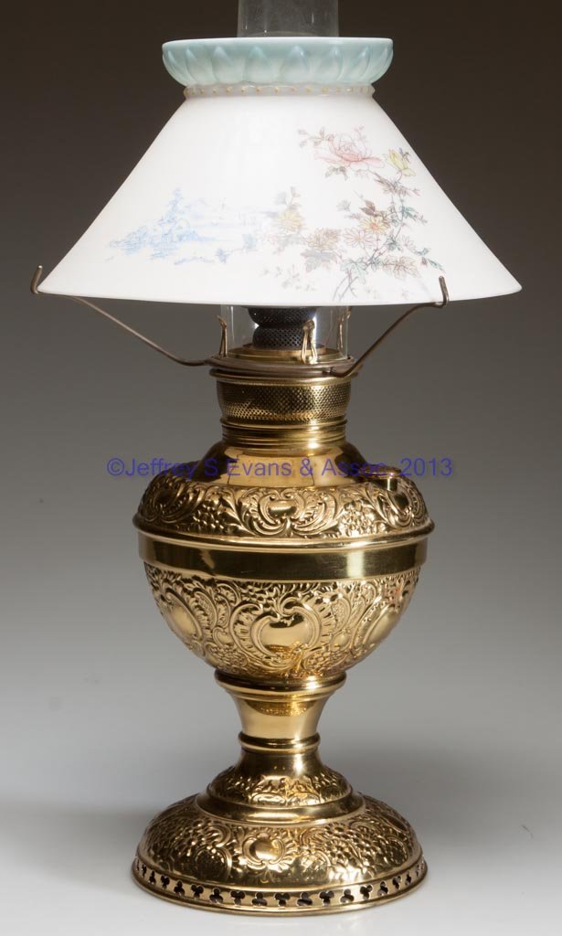 MILLER "THE JUNO LAMP" BRASS STAND LAMP: MILLER "THE JUNO LAMP" BRASS STAND LAMP, name embossed on shoulder, original central-draft burner with "EM & CO" flame spreader, period transfer-decorated opal cone shade, non-period shade spider and