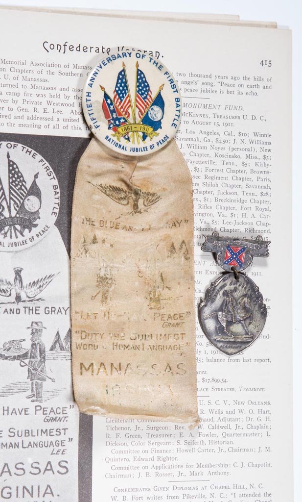 CIVIL WAR VETERANS REUNION BADGES, LOT OF TWO: CIVIL WAR VETERANS REUNION BADGES, LOT OF TWO, comprising a 1907 Richmond Confederate Veteran Cavalry Association badge depicting Gen. J. E. B. Stuart, and a 1911 Fiftieth Anniversary of the First Bat